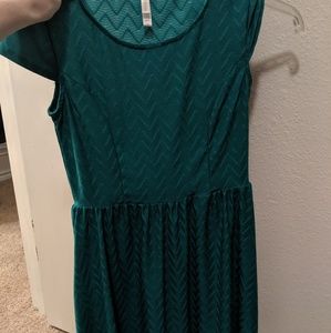 Green knee length dress